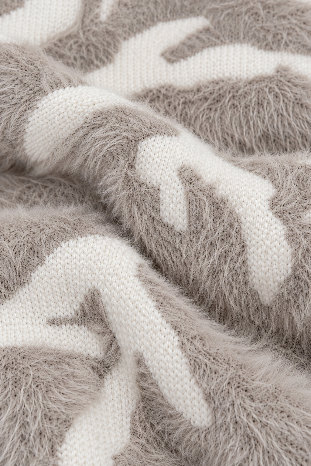 Pleun damesjasje in crème en taupe met pluizige jacquardstructuur – HoldVast